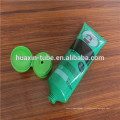 Tube en plastique vert D55 avec bouchon supérieur rabattable